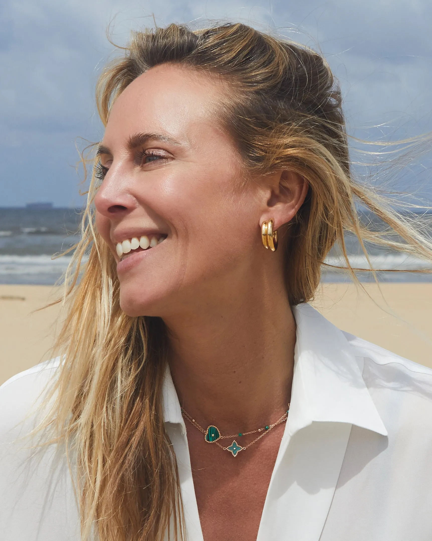 Yellow gold round earrings with a double tube